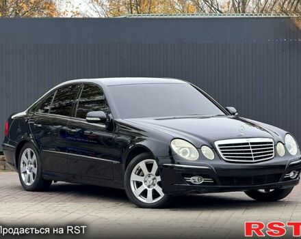 Черный Мерседес Е-Класс, объемом двигателя 1.8 л и пробегом 220 тыс. км за 5950 $, фото 1 на Automoto.ua