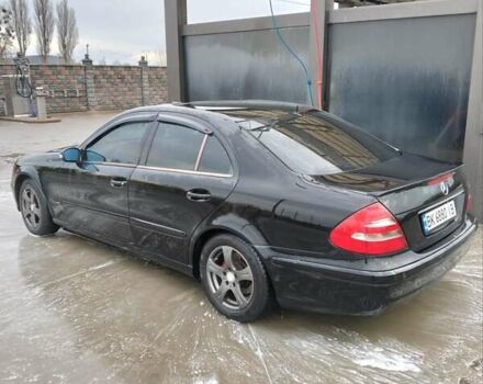 Черный Мерседес Е-Класс, объемом двигателя 1.8 л и пробегом 40 тыс. км за 5700 $, фото 5 на Automoto.ua