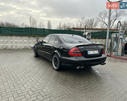 Чорний Мерседес Е-Клас, об'ємом двигуна 5 л та пробігом 250 тис. км за 8000 $, фото 4 на Automoto.ua