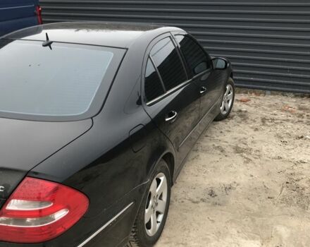 Черный Мерседес Е-Класс, объемом двигателя 3.2 л и пробегом 150 тыс. км за 6300 $, фото 1 на Automoto.ua