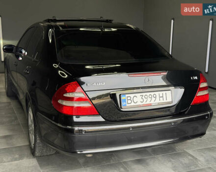 Черный Мерседес Е-Класс, объемом двигателя 4 л и пробегом 237 тыс. км за 7999 $, фото 6 на Automoto.ua