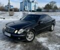 Черный Мерседес Е-Класс, объемом двигателя 2 л и пробегом 350 тыс. км за 6299 $, фото 1 на Automoto.ua