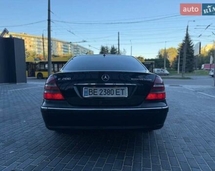 Черный Мерседес Е-Класс, объемом двигателя 2 л и пробегом 350 тыс. км за 5999 $, фото 2 на Automoto.ua
