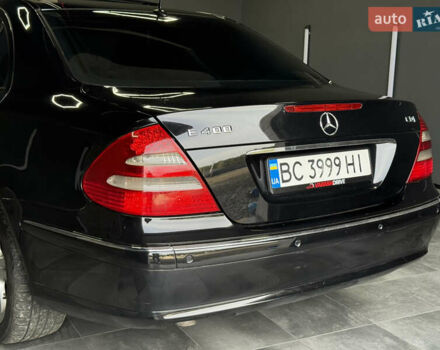 Черный Мерседес Е-Класс, объемом двигателя 4 л и пробегом 237 тыс. км за 7999 $, фото 3 на Automoto.ua