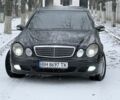 Чорний Мерседес Е-Клас, об'ємом двигуна 2.1 л та пробігом 444 тис. км за 7500 $, фото 1 на Automoto.ua