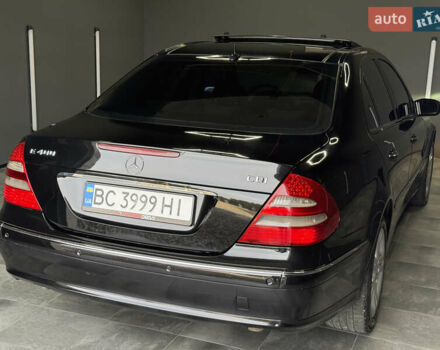 Черный Мерседес Е-Класс, объемом двигателя 4 л и пробегом 237 тыс. км за 7999 $, фото 7 на Automoto.ua