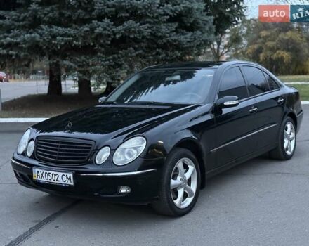 Мерседес Е-Клас 2005 у Рівному на Automoto.ua Чорний Мерседес Е-Клас, об'ємом двигуна 1.8 л та пробігом 255 тис. км за 5800 $, фото 1 на Automoto.ua