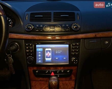 Мерседес Е-Клас 2005 у Рівному на Automoto.ua Чорний Мерседес Е-Клас, об'ємом двигуна 1.8 л та пробігом 255 тис. км за 5800 $, фото 65 на Automoto.ua