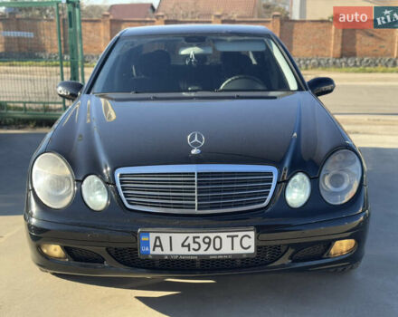 Черный Мерседес Е-Класс, объемом двигателя 1.8 л и пробегом 338 тыс. км за 6850 $, фото 6 на Automoto.ua