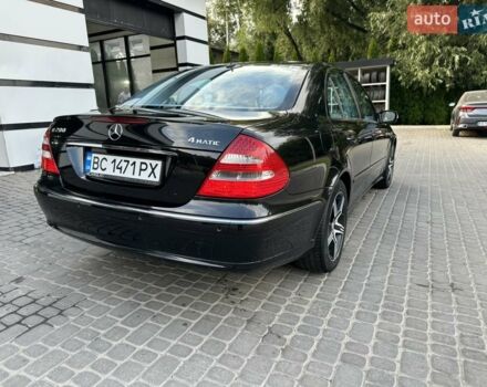 Чорний Мерседес Е-Клас, об'ємом двигуна 3 л та пробігом 160 тис. км за 10900 $, фото 1 на Automoto.ua