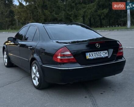 Мерседес Е-Клас 2005 у Рівному на Automoto.ua Чорний Мерседес Е-Клас, об'ємом двигуна 1.8 л та пробігом 255 тис. км за 5800 $, фото 28 на Automoto.ua