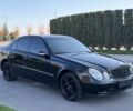 Чорний Мерседес Е-Клас, об'ємом двигуна 2 л та пробігом 200 тис. км за 6400 $, фото 1 на Automoto.ua