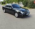 Черный Мерседес Е-Класс, объемом двигателя 2.1 л и пробегом 282 тыс. км за 5600 $, фото 1 на Automoto.ua