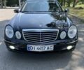 Черный Мерседес Е-Класс, объемом двигателя 3 л и пробегом 297 тыс. км за 10359 $, фото 1 на Automoto.ua