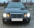Черный Мерседес Е-Класс, объемом двигателя 2 л и пробегом 245 тыс. км за 7500 $, фото 1 на Automoto.ua