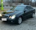 Черный Мерседес Е-Класс, объемом двигателя 2 л и пробегом 245 тыс. км за 7500 $, фото 1 на Automoto.ua