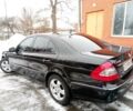 Чорний Мерседес Е-Клас, об'ємом двигуна 2.2 л та пробігом 327 тис. км за 12500 $, фото 1 на Automoto.ua
