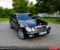 Чорний Мерседес Е-Клас, об'ємом двигуна 3 л та пробігом 240 тис. км за 9500 $, фото 1 на Automoto.ua