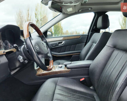 Черный Мерседес Е-Класс, объемом двигателя 5.5 л и пробегом 146 тыс. км за 14990 $, фото 12 на Automoto.ua