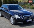 Черный Мерседес Е-Класс, объемом двигателя 2.2 л и пробегом 153 тыс. км за 20000 $, фото 1 на Automoto.ua