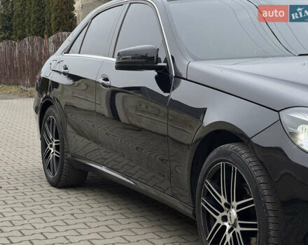 Чорний Мерседес Е-Клас, об'ємом двигуна 2 л та пробігом 329 тис. км за 13600 $, фото 5 на Automoto.ua