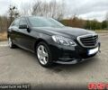 Чорний Мерседес Е-Клас, об'ємом двигуна 21 л та пробігом 125 тис. км за 24400 $, фото 1 на Automoto.ua