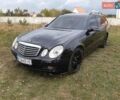 Чорний Мерседес Е-Клас, об'ємом двигуна 2.2 л та пробігом 324 тис. км за 9300 $, фото 1 на Automoto.ua