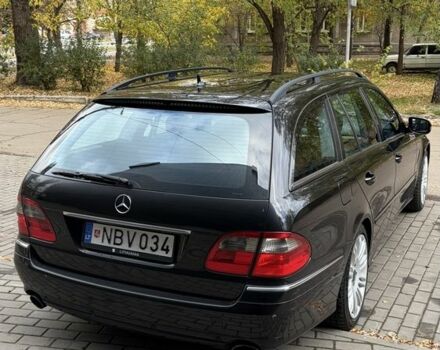 Черный Мерседес Е-Класс, объемом двигателя 3 л и пробегом 300 тыс. км за 4900 $, фото 7 на Automoto.ua