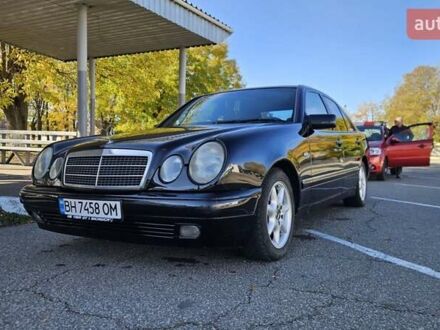 Черный Мерседес Е-Класс, объемом двигателя 2.3 л и пробегом 400 тыс. км за 4400 $, фото 1 на Automoto.ua