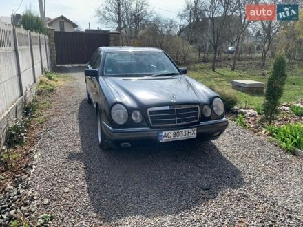 Черный Мерседес Е-Класс, объемом двигателя 2 л и пробегом 150 тыс. км за 8500 $, фото 1 на Automoto.ua