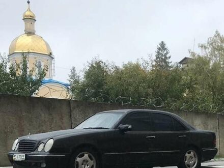 Чорний Мерседес Е-Клас, об'ємом двигуна 2 л та пробігом 403 тис. км за 4500 $, фото 1 на Automoto.ua