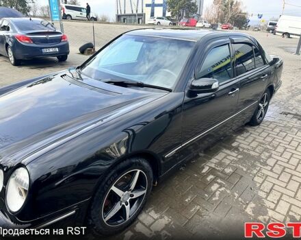 Черный Мерседес Е-Класс, объемом двигателя 3.2 л и пробегом 200 тыс. км за 5500 $, фото 1 на Automoto.ua