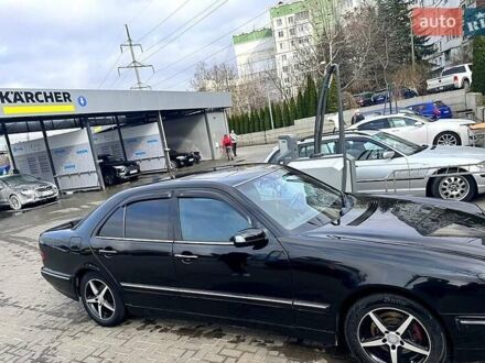 Черный Мерседес Е-Класс, объемом двигателя 3.2 л и пробегом 200 тыс. км за 5500 $, фото 1 на Automoto.ua