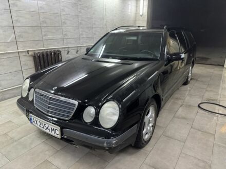 Черный Мерседес Е-Класс, объемом двигателя 2.6 л и пробегом 200 тыс. км за 2500 $, фото 1 на Automoto.ua
