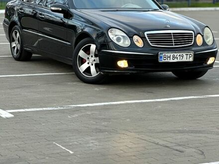 Черный Мерседес Е-Класс, объемом двигателя 3.2 л и пробегом 240 тыс. км за 4699 $, фото 1 на Automoto.ua