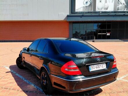 Черный Мерседес Е-Класс, объемом двигателя 2.4 л и пробегом 235 тыс. км за 5100 $, фото 1 на Automoto.ua