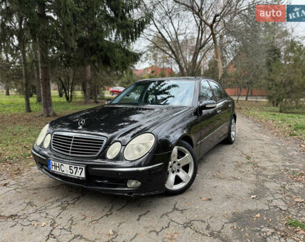 Черный Мерседес Е-Класс, объемом двигателя 3.2 л и пробегом 340 тыс. км за 2999 $, фото 1 на Automoto.ua
