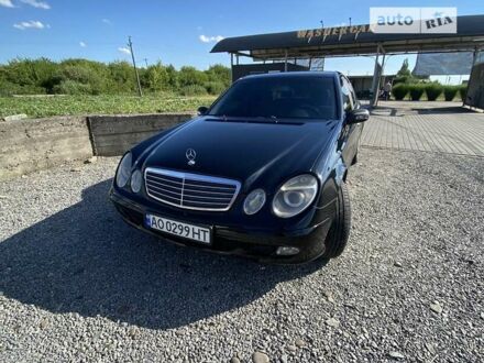 Мерседес Е-Клас 2003 у Виноградове на Automoto.ua Чорний Мерседес Е-Клас, об'ємом двигуна 2.1 л та пробігом 320 тис. км за 7200 $, фото 1 на Automoto.ua