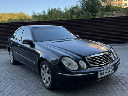 Мерседес Е-Клас 2003 у Хмельницькому на Automoto.ua Чорний Мерседес Е-Клас, об'ємом двигуна 3.2 л та пробігом 301 тис. км за 4300 $, фото 1 на Automoto.ua