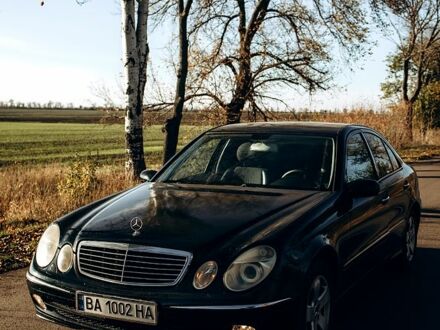 Черный Мерседес Е-Класс, объемом двигателя 1.8 л и пробегом 221 тыс. км за 6200 $, фото 1 на Automoto.ua