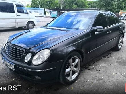 Черный Мерседес Е-Класс, объемом двигателя 1.8 л и пробегом 390 тыс. км за 6750 $, фото 1 на Automoto.ua