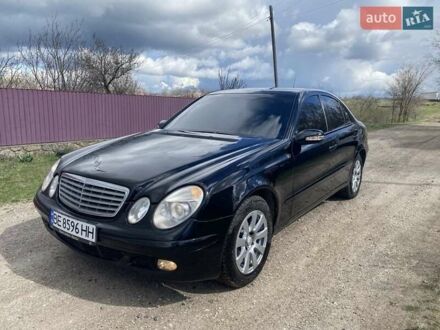 Чорний Мерседес Е-Клас, об'ємом двигуна 2.1 л та пробігом 300 тис. км за 6800 $, фото 1 на Automoto.ua