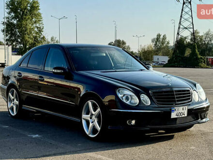 Черный Мерседес Е-Класс, объемом двигателя 5 л и пробегом 238 тыс. км за 12000 $, фото 1 на Automoto.ua