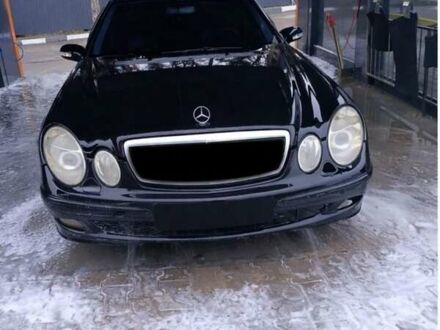 Черный Мерседес Е-Класс, объемом двигателя 3.2 л и пробегом 270 тыс. км за 4950 $, фото 1 на Automoto.ua