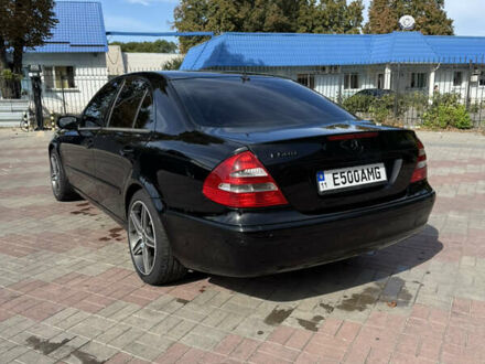Черный Мерседес Е-Класс, объемом двигателя 4.97 л и пробегом 360 тыс. км за 10000 $, фото 1 на Automoto.ua
