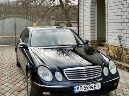 Черный Мерседес Е-Класс, объемом двигателя 2.4 л и пробегом 205 тыс. км за 7550 $, фото 1 на Automoto.ua