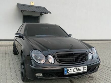 Чорний Мерседес Е-Клас, об'ємом двигуна 2 л та пробігом 375 тис. км за 5600 $, фото 1 на Automoto.ua