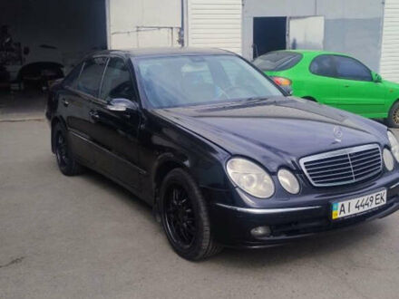Чорний Мерседес Е-Клас, об'ємом двигуна 3.2 л та пробігом 395 тис. км за 6500 $, фото 1 на Automoto.ua