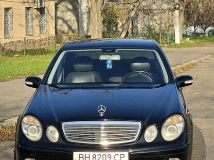 Черный Мерседес Е-Класс, объемом двигателя 1.8 л и пробегом 267 тыс. км за 6600 $, фото 1 на Automoto.ua