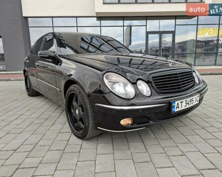 Черный Мерседес Е-Класс, объемом двигателя 3 л и пробегом 325 тыс. км за 8599 $, фото 1 на Automoto.ua